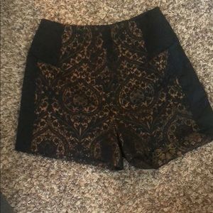 Bebe high waisted black and gold shorts